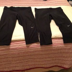 TWO pairs of Nike women’s cropped dri-fit capris